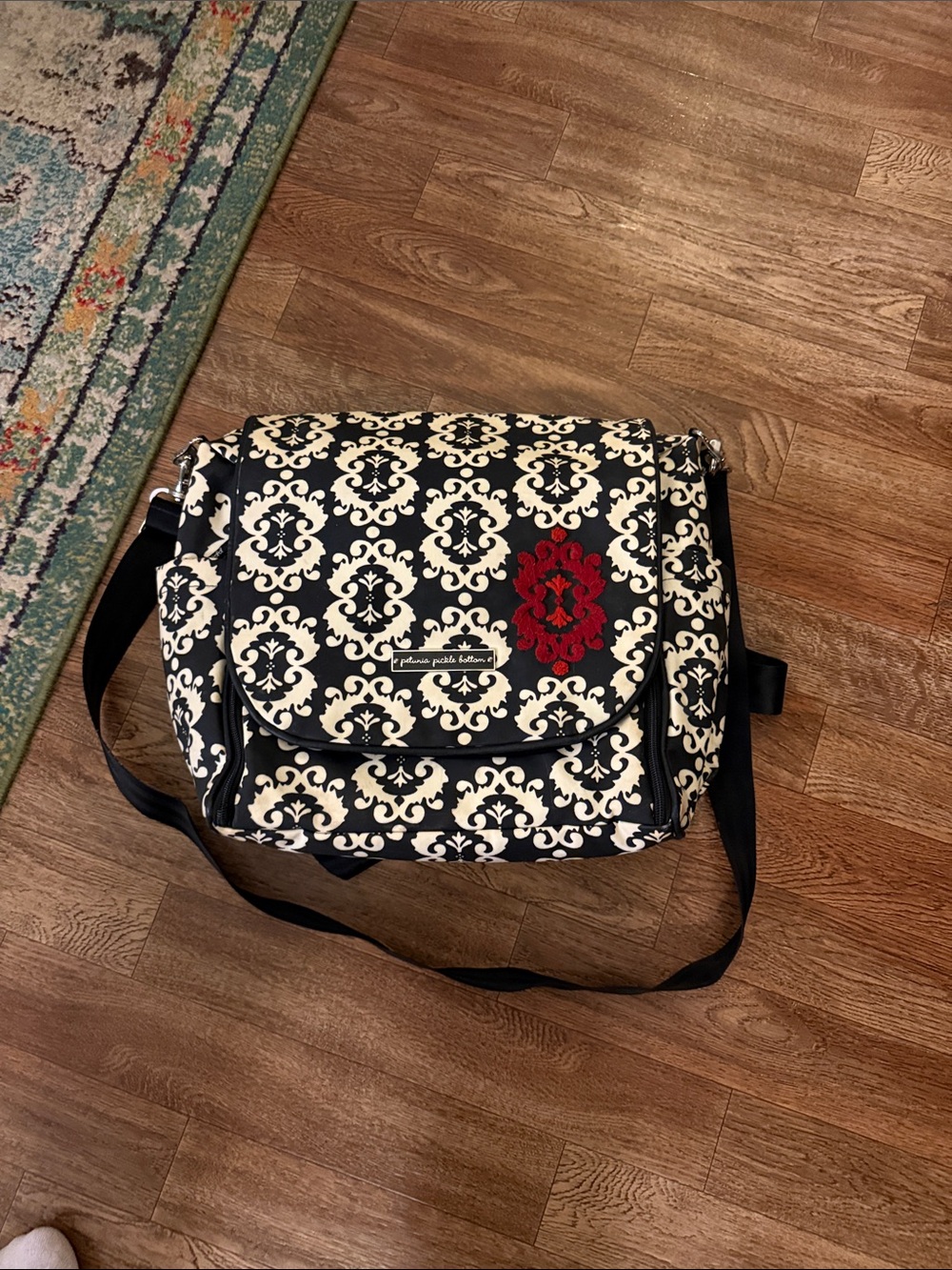 Black and Cream Patterned Crossbody Diaper Bag with Red Accent petunia pickleb